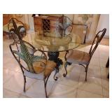 Largo Furniture Pina Colada wrought iron dining set features a beveled glass top table with a unique pineapple-shaped base 29 3/4" T x 47" across. and tropical-accented metal chairs, back height 42" x