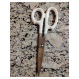 Cutco Model 77 Super Shears 2.0 high-carbon stainless steel blades and white handles. 8 1/2" L