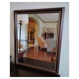 Mirror, dark wood frame with gold trim. 22 1/2 T x  18 1/2 W.