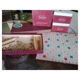 Vintage Scrabble crossword game set, by Selchow & Righter, and a Vintage 1983 Trivial Pursuit Baby Boomer Edition Subsidiary Card Set, identified by its red packaging.