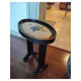Black painted decorative accent table with a grape motif painted on the top surface, has a chip see pics, 24 1/4" T x 20" W x 13" D.