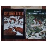 2 art books showcasing the work of artist Bev Doolittle." The Art of Bev Doolittle", a collection of her popular camouflage paintings, and "The Forest Has Eyes", also a 2001 Calendar with great prints