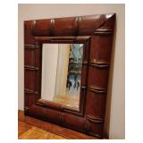 Bamboo framed rectangular beveled mirror. 16 3/4" T x 14 3/4" W.