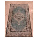 Great Area Rug vintage-style Turkish Oushak rug, often featuring aqua or teal colors with distressed floral patterns and a central medallion. 3
