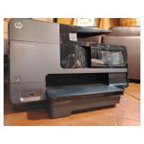 HP Officejet Pro 8620 e-All-in-One Printer. Powers up, copier works, one ink cartridge included.