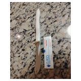 Cutco Table Knife (Model 1759W) features a Pearl White ergonomic handle and a serrated Double-D edge blade. 8 1/2" L