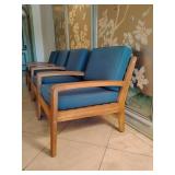 Set of 2 Christopher Knight Home Grenada Outdoor Acacia Wood Club Chairs, featuring a teak finish frame and water-resistant teal or blue cushions.