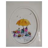 vintage framed watercolor painting depicting a beach scene with a yellow umbrella, dated 1989. 
Artist: Signed "Rubymae" 1989, 7 1/4" x 5 1/4", nice frame.