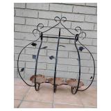 Wrought iron plant/violet holder, 25" T x 26 1)4" W, 7" Deep.