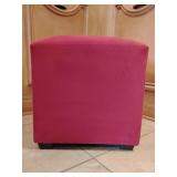Upholstered footstool, soft magenta, faux suede, visible stitching, square wooden feet, 18" T x 16" x 16"