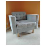 IKEA Landskrona armchair, tufted cushions and round wooden legs. The left arm has slight wear. Back height 30", arm height 26", seat height 17", deep seat at 26", 36" W, 35" total depth. Woven/wool li