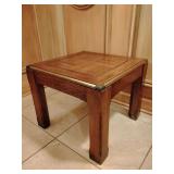 End table, mid-century modern, wood grain inlays, top edges trimmed and feet wrapped in brass tone metal, 16" T x 19 1/2" x 19 1/2".
