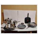 Cookware: 2 New T-fal, griddle, large skillet. All rest used, Green Pan, little egg, Bergner 1.5 saucepan, Faberware large skillet, heavy pizza crisper, Rever Ware large stock pot.