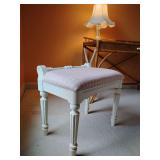 Lexington Furniture vanity stool, antique white finish and turned legs, low backrest, soft pink/white check with leaves. Back height 19 1/2", seat height 18 3/4", 22" W, 14" D.