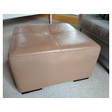 Light brown leather cocktail ottoman, square wood legs, 15" T x 25" x 25".