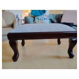 THE BOMBAY COMPANY Upholstered Footstool, 9 1/2" T x 17" W x 12" D, legs need tightening.