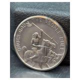 1974 South Dakota Indian Riding Horse Souvenir Dollar…..made of copper/nickel - numbering on side of coin is 004123