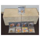 Collection of eight(8) Lincoln cents(and 1 Old Canadian Coin) packaged inside souvenir plastic cases commemorating specific times in history SEE ALL PICS FOR DETAILS...