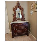Beautiful antique dresser with marble top. Contents NOT included. 41x21x36.5 in tall not including mirror. Mirror is 33.5 x 48 in tall.