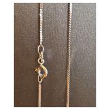 18K white gold chain. 18 in long. Weight is 2.05 grams.