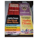 Grouping of 4 Agatha Christie hardback books with dust cover. See all photos for titles.