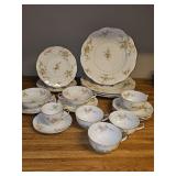 Theodore Haviland Rosalinde China. Misc pieces. Two cream soup bowls with under plates, one dimitasse cup and saucer, four dinner plates, two salad plates, three saucers, four cups.