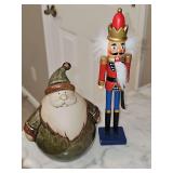 Roly poly studio pottery Santa and wood nutcracker.
