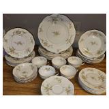 Theodore Haviland Rosalinde China. Five 7-piece place settings.