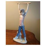 SIGNED Lladro "Little Leaguer Exercising" porcelain figurine. 12.25 in tall.