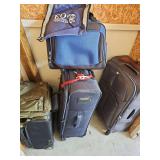 Luggage. 22, 30, 31 in on wheels. Backpack and carry-on on wheels. Does NOT include purple it bag.