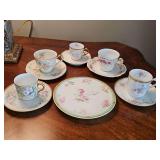 4 Limoges France teacups and saucers and a trivet. 1 Havilland New York cup and saucer.