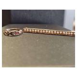 Gold tone seed pearl pin 1.5 in long and baby ring. Unmarked. Non-reactive to magnet. 1.89 grams