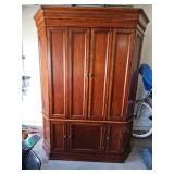 Hooker entertainment cabinet. 60x22x80 in tall.