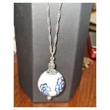 6.12 grams sterling silver rope chain with blue and white ball pendant.