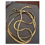 14K yellow gold chain. 22 in long. Needs clasp repair.  7.67 grams