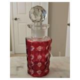 Antique cranberry glass perfume bottle.