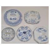 Five blue transferware domed lids used as wall hangings. 7-10 in diameter.