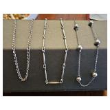 three sterling silver necklaces. From left to right 22, 16, and 17 in length.