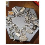 Sterling charm bracelet with sterling charms.