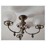 Vintage brass chandelier. Approximate 22 in diameter x 14 in tall.