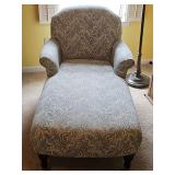 Vintage Paisley upholstered chaise with brass casters. 30x52x32 in tall. Seat height 16in.