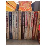 Grouping of 11 Agatha Christie paperback books. See all photos for titles.