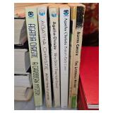 Grouping of 5 Agatha Christie paperback books. ENGLAND EDITIONS. See all photos for titles.
