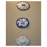 Trio of antique domed lids used as decor items. Very lovely.