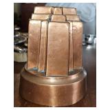 Antique copper jelly mould featuring a design known as the "Alexandra Cross". "REGISTERED APRIL 29.1883" indicates its registration date during the Victorian era. Opening diameter 5.25X 6.5 in tall.