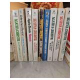 Grouping of 10 Agatha Christie paperback books. See all photos for titles.