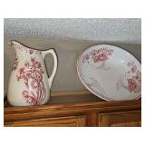 Red transfer wear bowl and pitcher. Pictures approximately 11 in tall, bowl is approximately 15-in diameter.