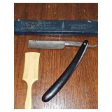 Bakelite baby comb and Columbia Cutlery straight razor with original box.