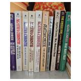 Grouping of 10 Agatha Christie paperback books. See all photos for titles.