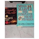 Two Agatha Christie books. One hard cover with dust jacket and one paperback.